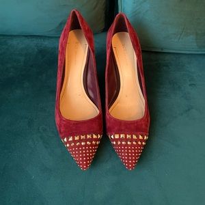 Really unique studded pointy- toes pumps. Burgundy suede with gold studs. 9.5